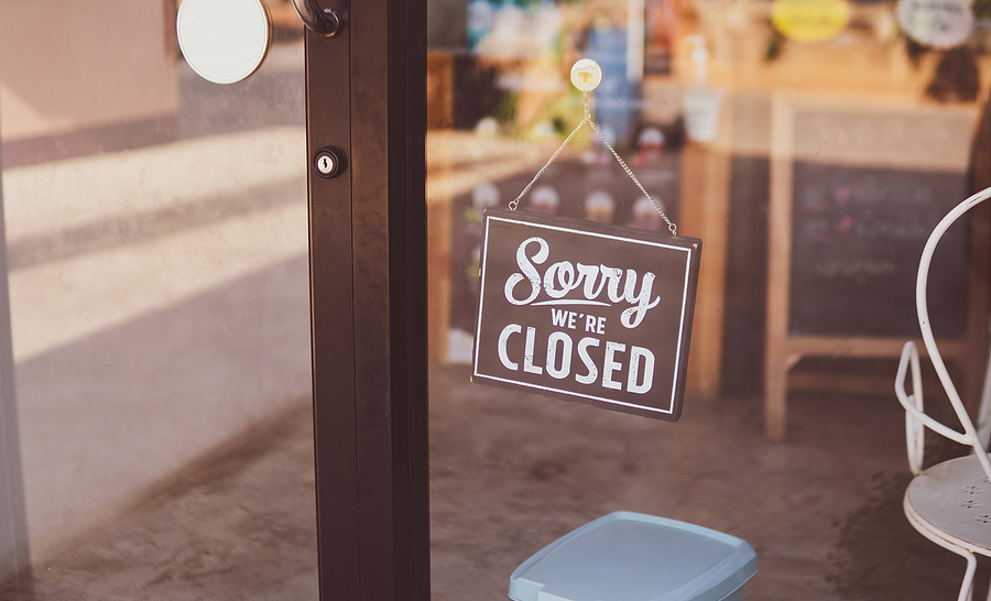 Business with a closed sign