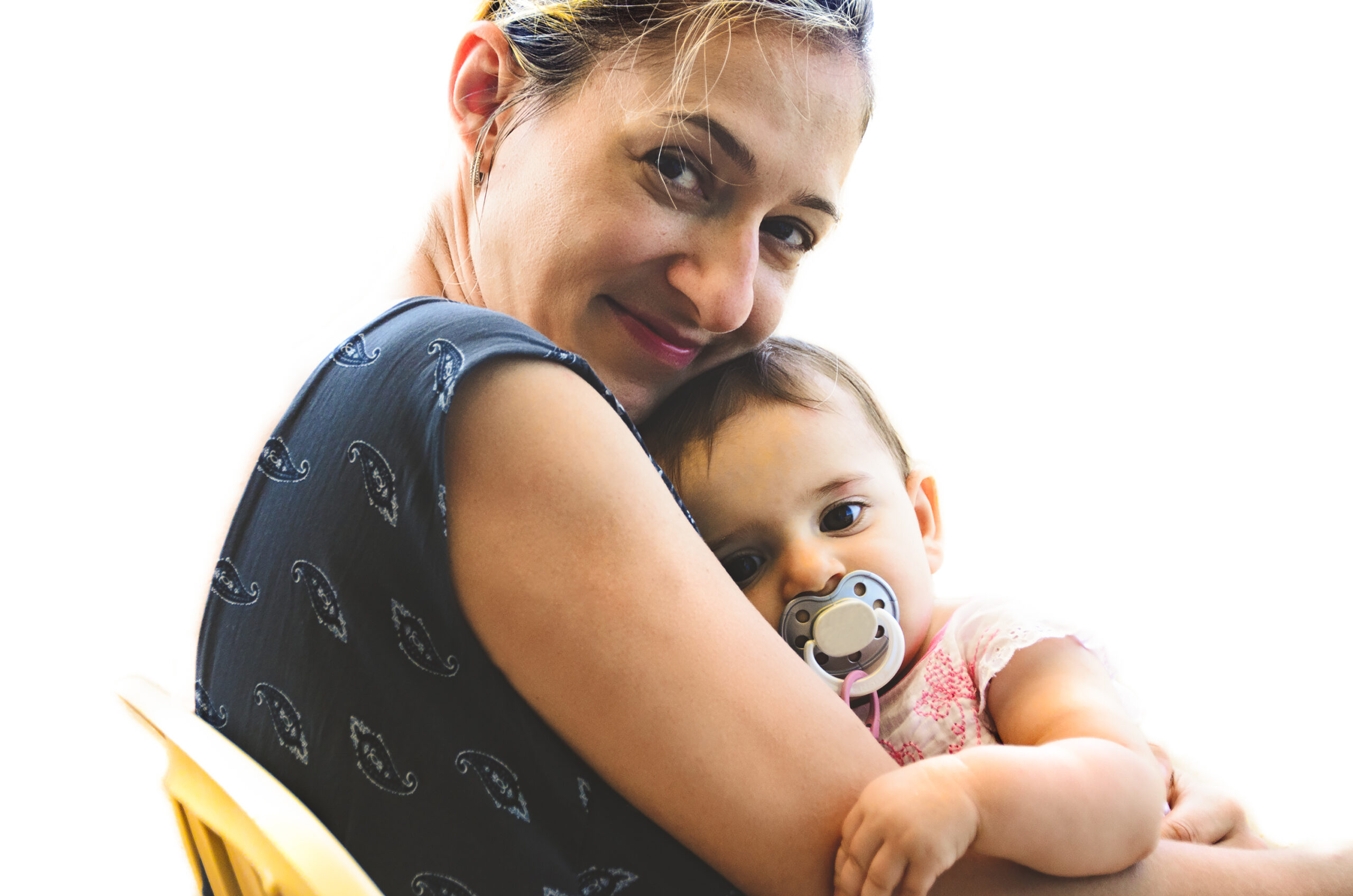 Rachel holds her newborn daughter